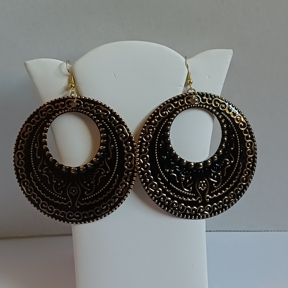 Black and gold metal earrings